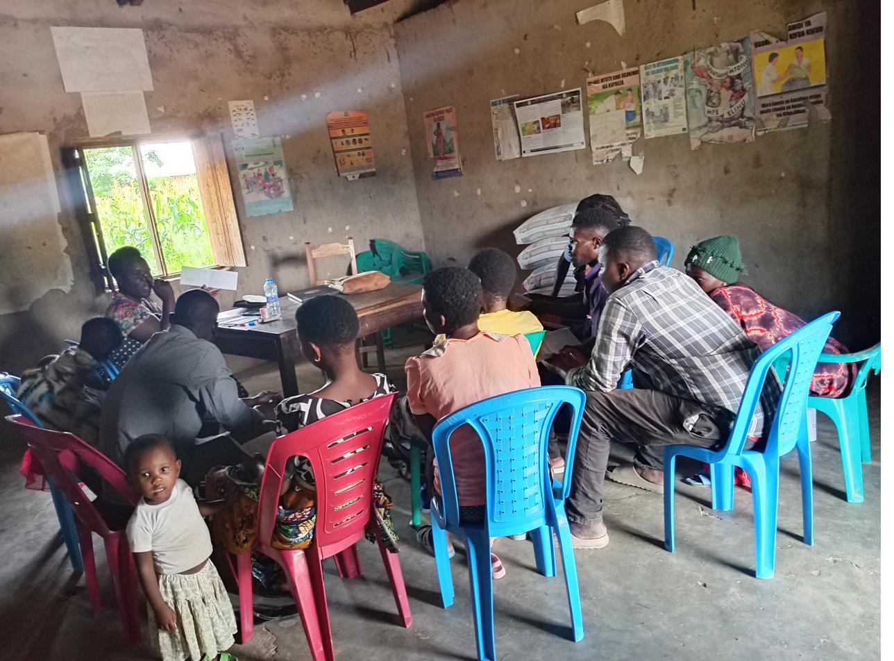 Field team conducting a household assessment interview